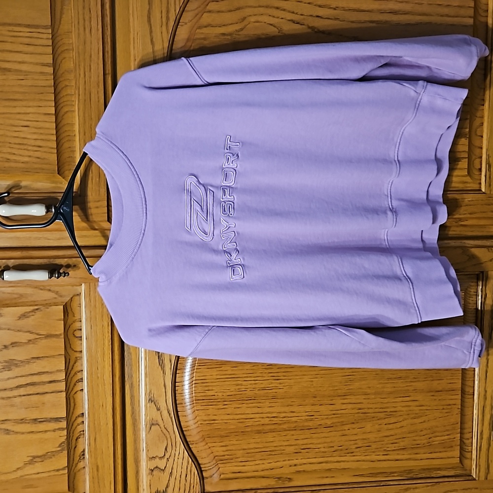 DKNY SPORT SIZE S USED BUT STILL HAS A LOT OF LIFE LEFT.